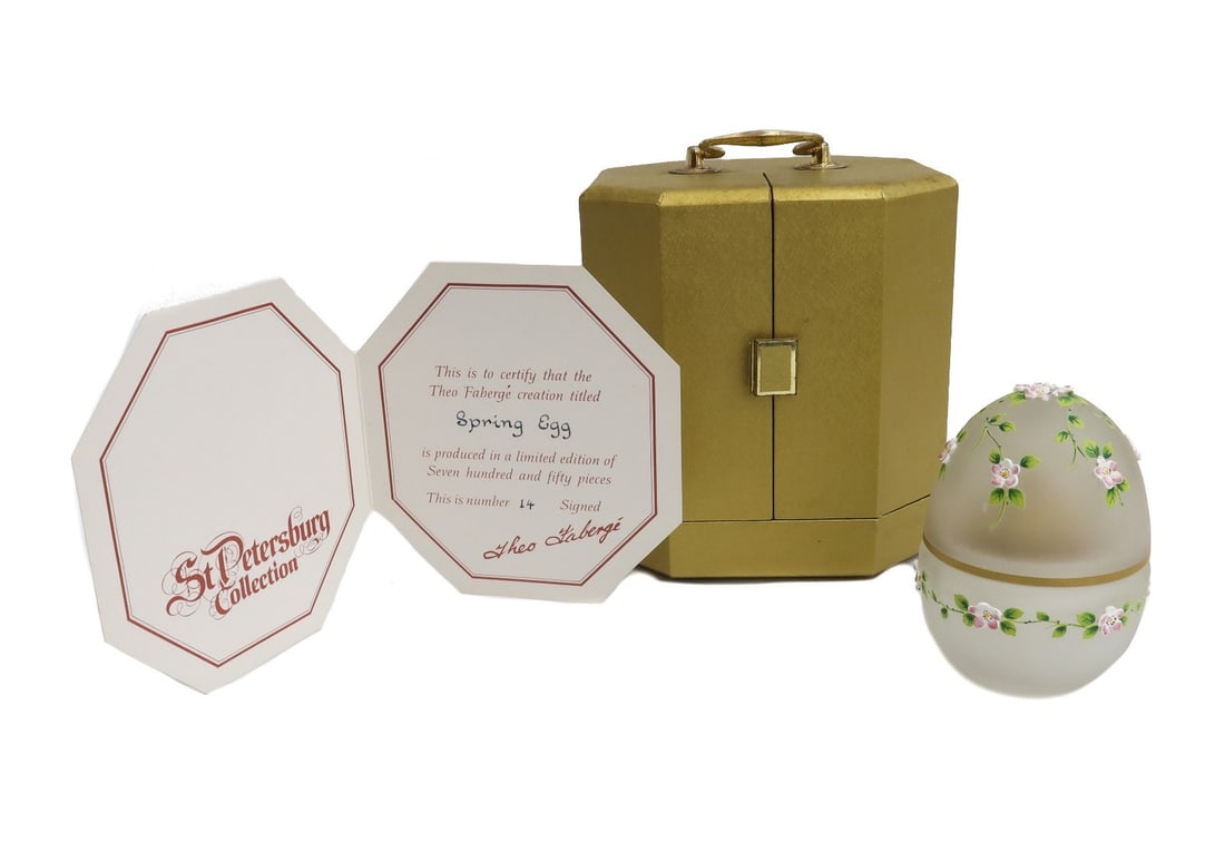 Theo Faberge Spring Egg Frosted Glass Sterling Silver with Box Ltd Ed 750: Theo Faberge "The Spring Egg" from the St Petersburg Collection. Frosted glass with hand painted enamel white flowers, opens to reveal a surprise golden yolk set in an Imperial crown with a ruby jewel