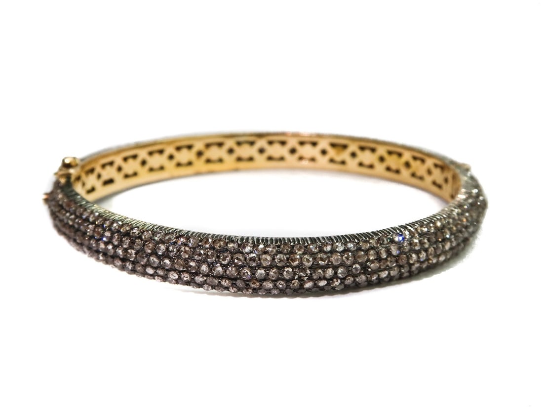 14k Yellow Gold Silver Topped and Rose Cut Diamond Hinged Bangle Bracelet: 14k yellow gold silver topped and rose cut diamond hinged bangle bracelet. Gold base and silver topped with 5 rows of encrusted rose cut diamonds weighing very roughly around 3.4 carats. Hinged with o