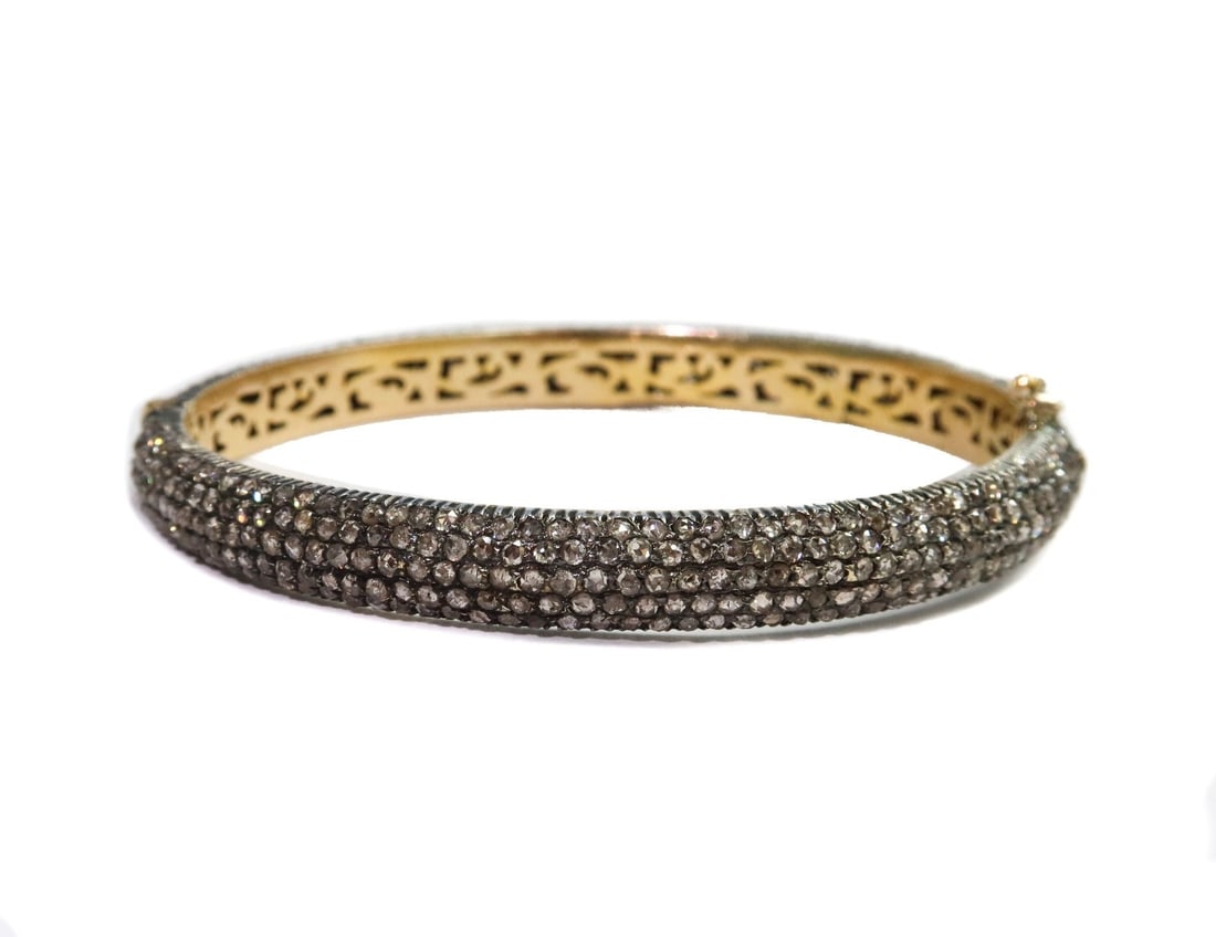 14k Yellow Gold Silver Topped and Rose Cut Diamond Hinged Bangle Bracelet: 14k yellow gold silver topped and rose cut diamond hinged bangle bracelet. Gold base and silver topped with 5 rows of encrusted rose cut diamonds weighing very roughly around 3.4 carats. Hinged with o