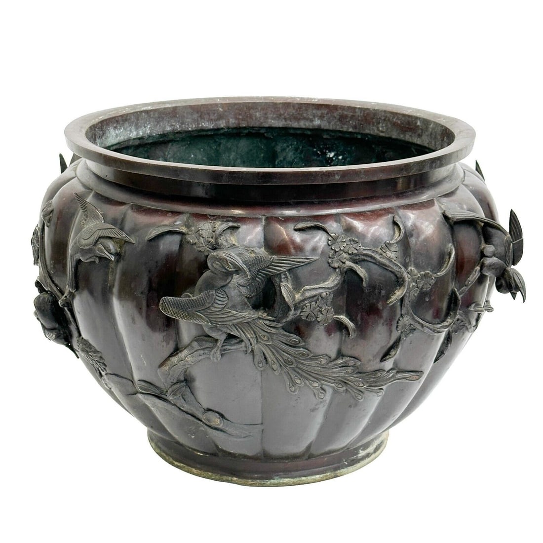 Murakami Japanese Bronze Planter Birds Meiji period: Japanese Bronze Planter. Raised bird decorations to the sides. Mark of Murakami to underside of base. Weight: Approx. 30 lbs Measurements: Approx. 18 inches diameter x 12.25 inches tall Condition: Oxi