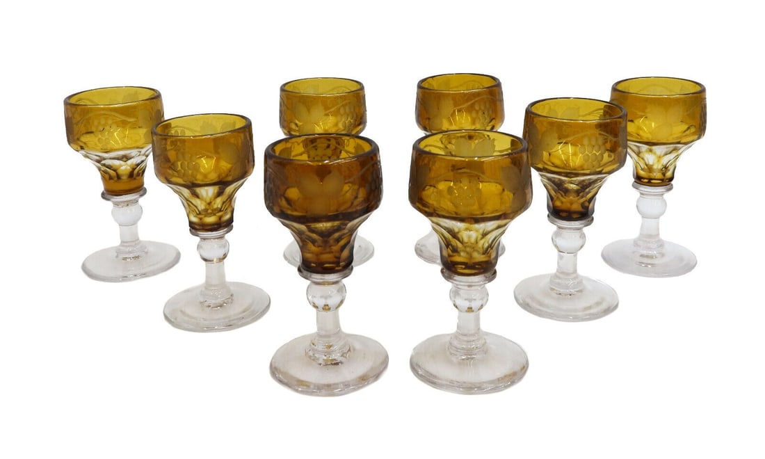 8 Bohemian Smokey Amber and Clear Cut Glass Cordial Wine Goblets c1940: 8 Bohemian smokey amber and clear cut glass cordial wine goblets, circa 1940. Amber glass to bowl with etched leaves. Pontil underside. Weight: Approx. 2 lbs Measurements: Approx.1.75 inches diameter 