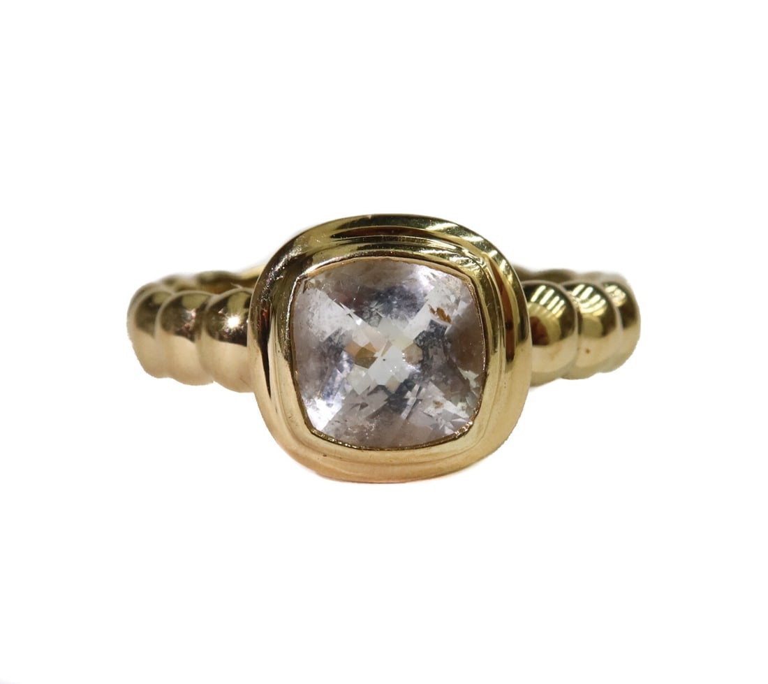 John Hardy 18k Yellow Gold Cushion Cut White Topaz Ring Size 7: John Hardy 18k yellow gold white topaz ring, size 7. Cushion cut white topaz center measuring approximately 8mm x 8mm x 4.4mm with a ribbed yellow gold band. Marked Hardy 18k to inner band, although i