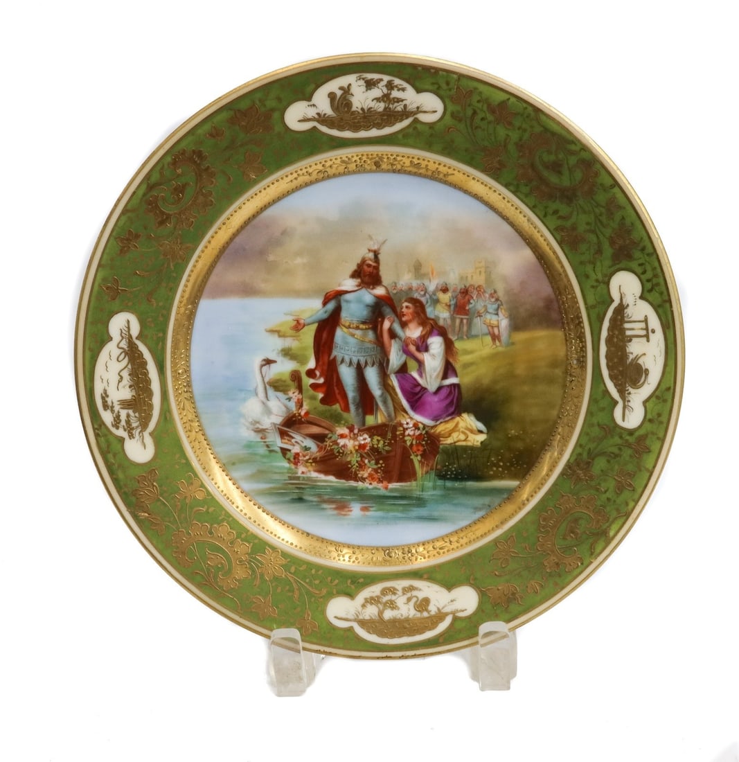 Royal Vienna Porcelain Portrait Plate Lohengrin Signed circa 1900: Royal Vienna porcelain plate "Lohengrin" circa 1900. The portrait plates depicts Lohengrin, a Knight of the Holy Grail and the son of Parsifal, being pulled to sea by swans and a woman at his knees. A