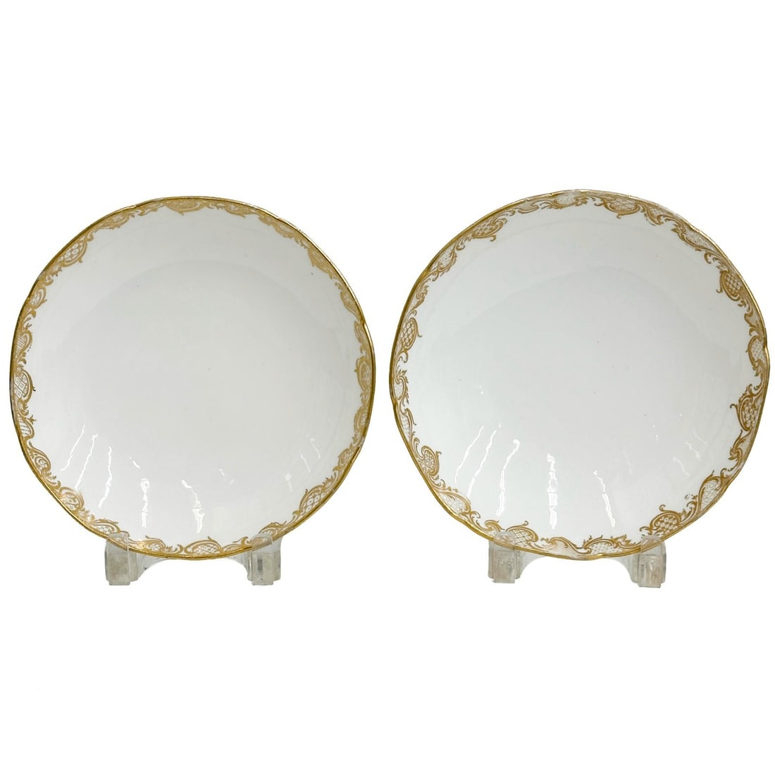 Pair Sevres Gilt Soft Paste Porcelain Round Serving Dishes circa 1775: Pair Sevres Gilt Soft Paste Porcelain Round Serving Dishes, circa 1775. A white ground with gilt decoration to the edge. Underside with Sevres marks. Weight: Approx. 2 lbs Measurements: Approx. 8.5 in