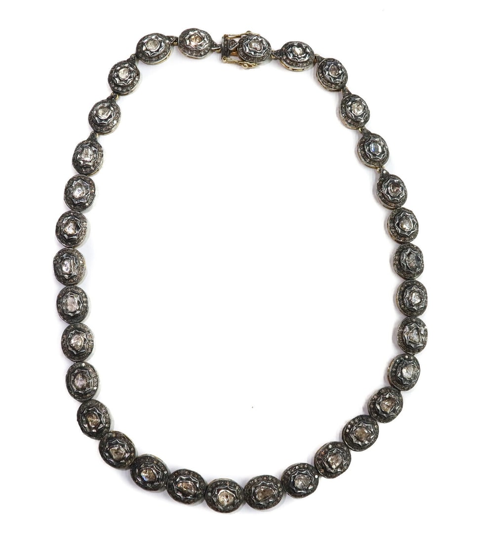 14k Yellow and Silver Topped Gold Old Mine Cut Diamond Link Necklace: 14k yellow and silver topped gold old mine cut diamond link necklace. 32 links adorned with old mine cut diamonds to center measuring approximately 4.11 mm with 19 round old mine cut diamonds to halo.