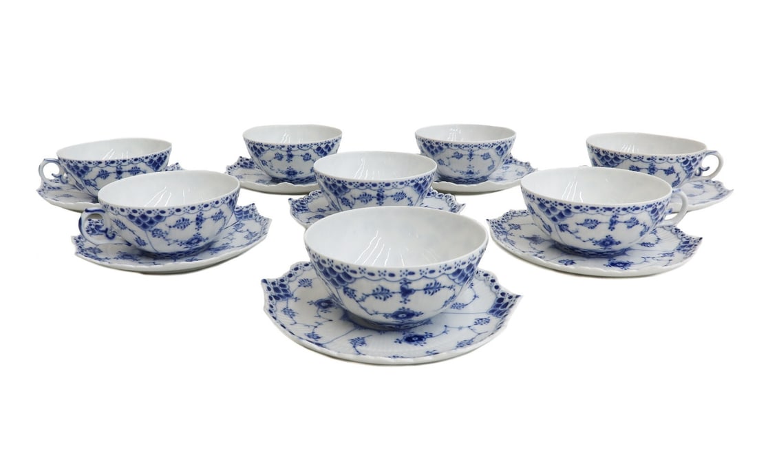 8 Royal Copenhagen Denmark Porcelain Full Lace No Trim Cup and Saucers #1130: 8 Royal Copenhagen Denmark porcelain full lace no trim cup and saucers #1130, Mid Century. Delicate blue floral design with a no trim lace edge. Underside with Royal Copenhagen marks #1130 dating to