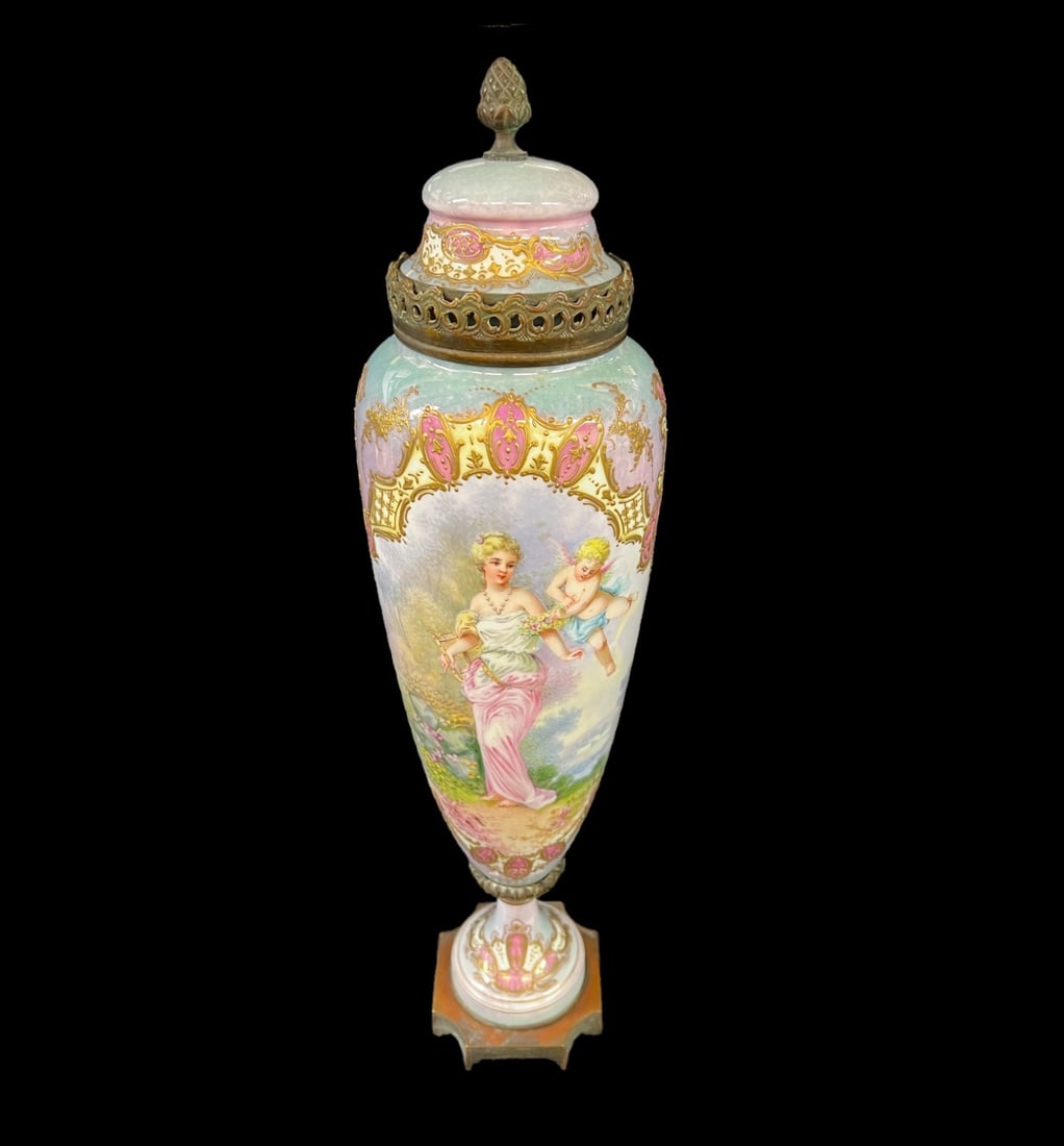French Gilt bronze mounted hand painted porcelain vase with cover: French Sevres-style Gilt bronze mounted hand painted porcelain vase with cover. Body of the vase hand painted with a youthful maid and putti, signed lower right, on the reverse, a landscape; all frame
