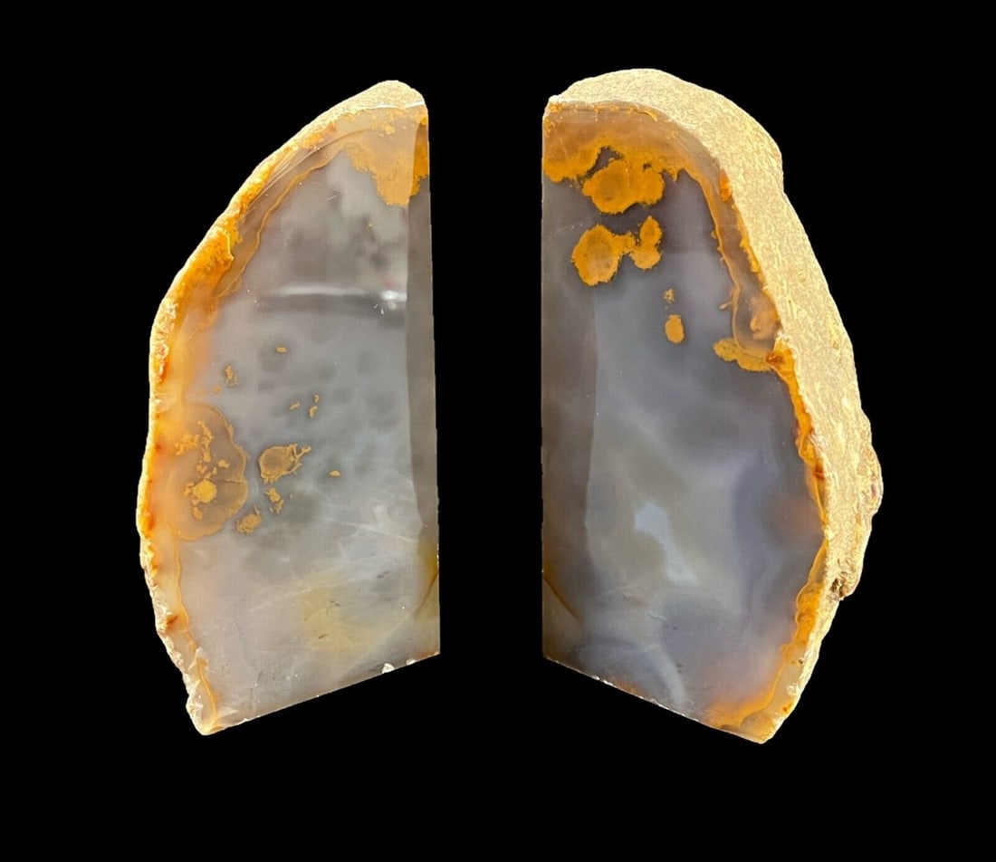 Natural Hand cut polished Hardstone Agate Geode Bookends: Natural Hand cut and polished Hardstone Agate Crystal Geode Bookends - one side of each bookend polished to gloss, one side matte. 8.2lbs Measurements: Approx. each bookend 6.5 in height x 3.5 x 3.5 i