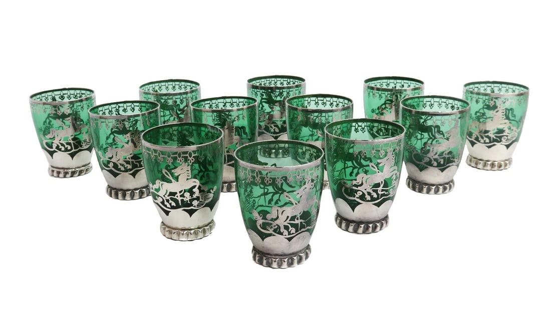 12 Murano Green Colored Glass and Silver Overlay Horse Cordial Wine Goblets: 12 Murano green colored glass and silver overlay cordial wine goblets. Silver overlay horses to the center with a monogram "AR" Weight: Approx. 2 lb Measurements: Approx.2.125 inches diameter x 2.75 i
