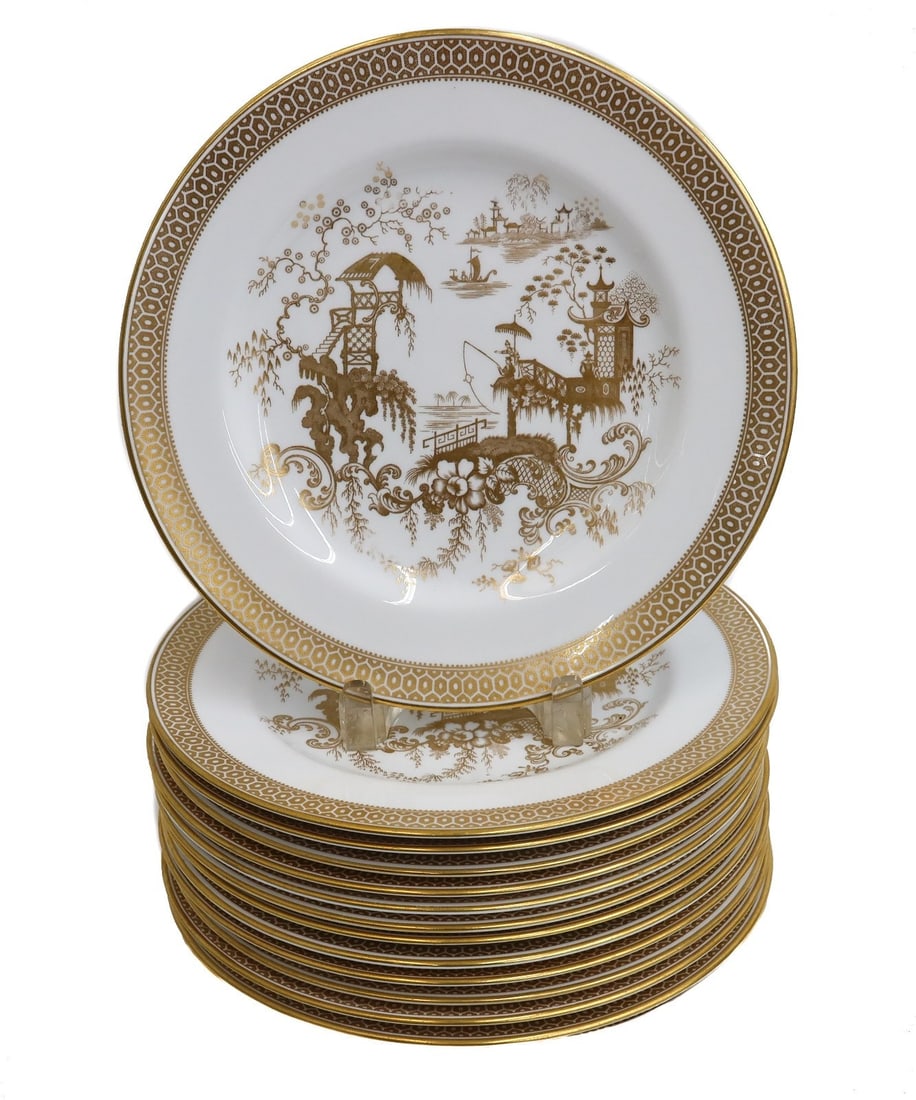 13 Copeland Spode Porcelain Dinner Plates in Spode's Garden Y7046 c1950: 13 Copeland Spode Gilt Porcelain dinner plates in Spode's Garden, circa 1950. A white ground with ornate gilt chinoiserie scenes to the center of figures fishing, geometric decoration to the edge. Und