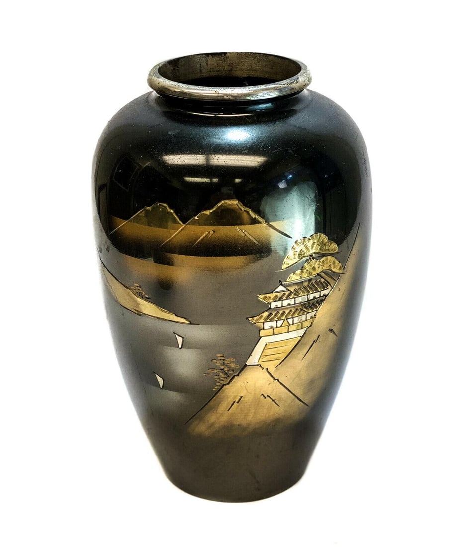 Japanese Gilt and Silver Patinated Metal Vase, Castle and Mountains: Japanese gilt and silver patinated metal vase. The central area depicts a Japanese castle atop a hill overlooking a river and mountains. Weight: Approx. 2 lbs Measurements: Approx. 5 inches diameter x