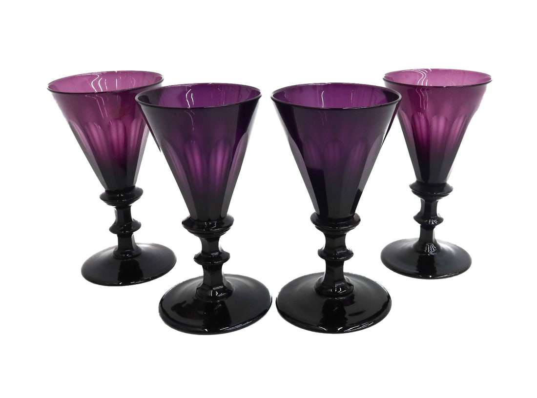 4 American Blown Amethyst Glass 4 ounce Wine Goblets circa 1920: 4 American blown amethyst glass 4 ounce wine goblets, circa 1920. Conical bowl with a baluster stem. Pontil underside. Weight Approx. 1 lb Measurements: Approx. 2.625 inches diameter x 5 inches Condit