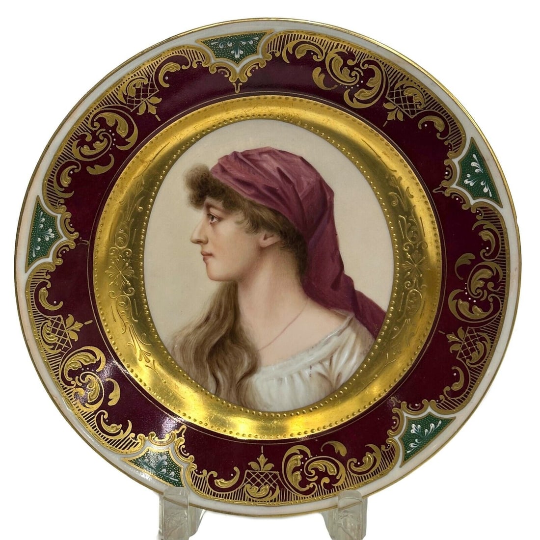Royal Vienna Austria Hand Painted Porcelain Portrait Plate Klea circa 1920: Royal Vienna Austria Hand Painted Porcelain Portrait Plate. Hand painted portrait of a woman to the center, artist signed to the Kenisek to the lower edge. Underside with Royal Vienna mark, marked "Au