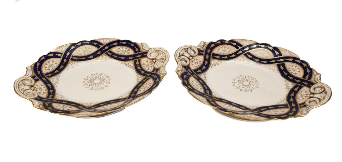 Continental Pair Hand Painted Scallop Rimmed Tazzas, circa 1900: Continental pair hand painted acallop eimmed tazzas, circa 1900. Beautiful hand painted flowers throughout. Weight: Approx. 3 lbs Measurements: Approx. 10.5" x 8.5" x 2.25" height Condition: Very good