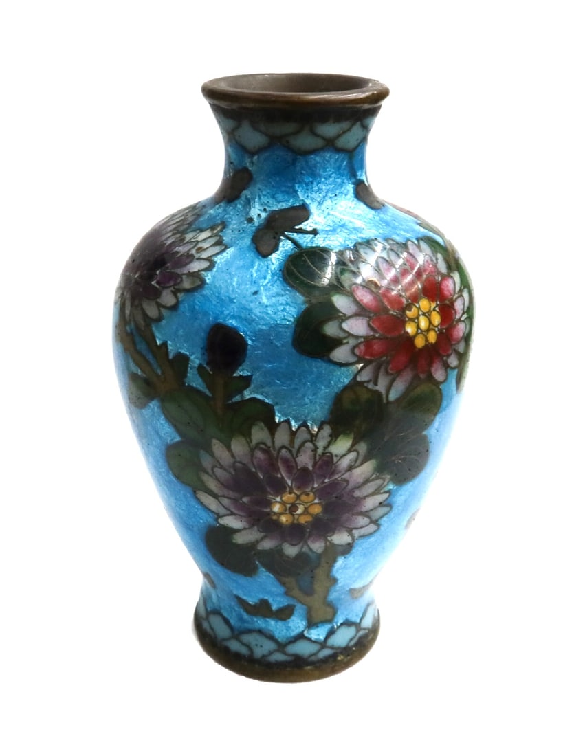 Japanese Ginbari Cloisonne Enamel Vase Blue and Floral Meiji Period: Japanese Ginbari cloisonne enamel floral vase, Meiji Period. Bright blue ground with multi-colored flowers throughout. Weight: Approx. .5 lb Measurements: Approx. 2.3 inches diameter x 4 inches tall C