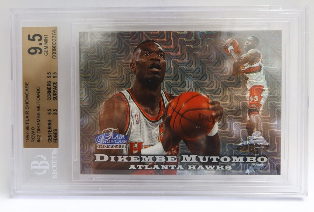 1997-98 Fleer Flair Showcase Dikembe Mutombo Atlanta Hawks Gem Mint 9.5: 1997-98 NBA Fleer Flair Showcase Dikembe Mutombo Atlanta Hawks Gem Mint 9.5 Card No. 42Gem Mint 9.5 - 0009002274 Condition: Please refer to images. Domestic Shipping:$30