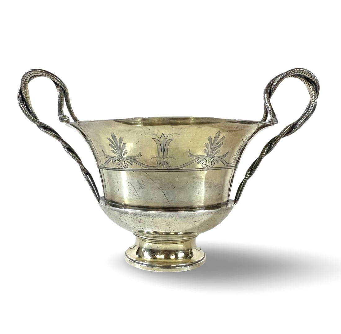 Jean Baptiste Claude Odiot Empire gilt coin silver libation bowl c1819-1838: Jean Baptiste Claude Odiot Empire style gilt coin silver libation bowl c1819-1838. Dual entwined serpentine handles, each with the heads of the snakes resting on the top of the lip, finely engraved fl