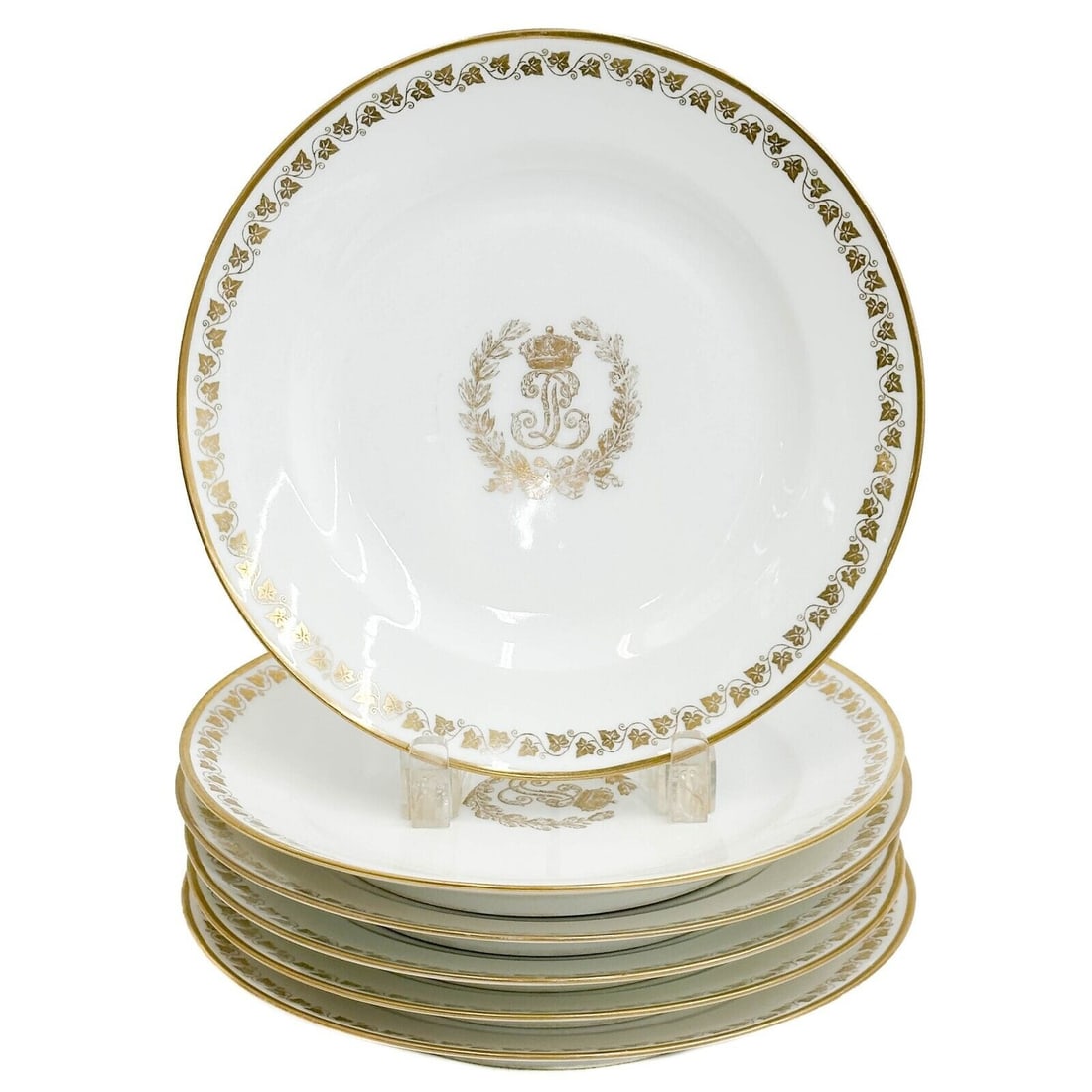 6 Manufacture de Sevres Louis Philippe for Chateau de Bizy Gilt Porcelain Plates: 6 Manufacture de Sevres Louis Philippe for Chateau de Bizy Gilt Porcelain Plates. A white ground decorated with gilt ivy leaves to the edge, stylized monogram to the center beneath a crown, framed by 