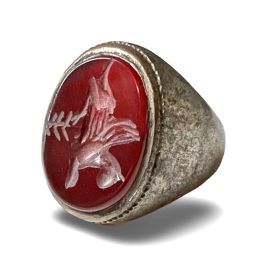 Sassanian Persian design hardstone gryphon signet ring sz11: Likely a Sassanian Persian design high-tin bronze or low grade silver, hardstone gryphon signet ring, a deep red oval carnelian (or agate) stone with a carved gryphon, set into a cast band. Measuremen