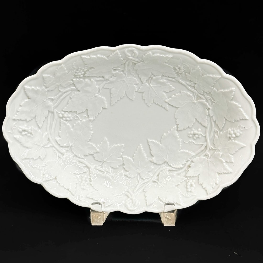 Meissen Germany Molded Porcelain Oval Dish Grapevine 19th century: Meissen Germany Molded Porcelain Oval Dish, circa 1900. Oval shaped dish with raised grapevine leaf decoration. Underside with Meissen crossed swords mark, 2 lines through mark. Weight: Approx. 1.5 lb
