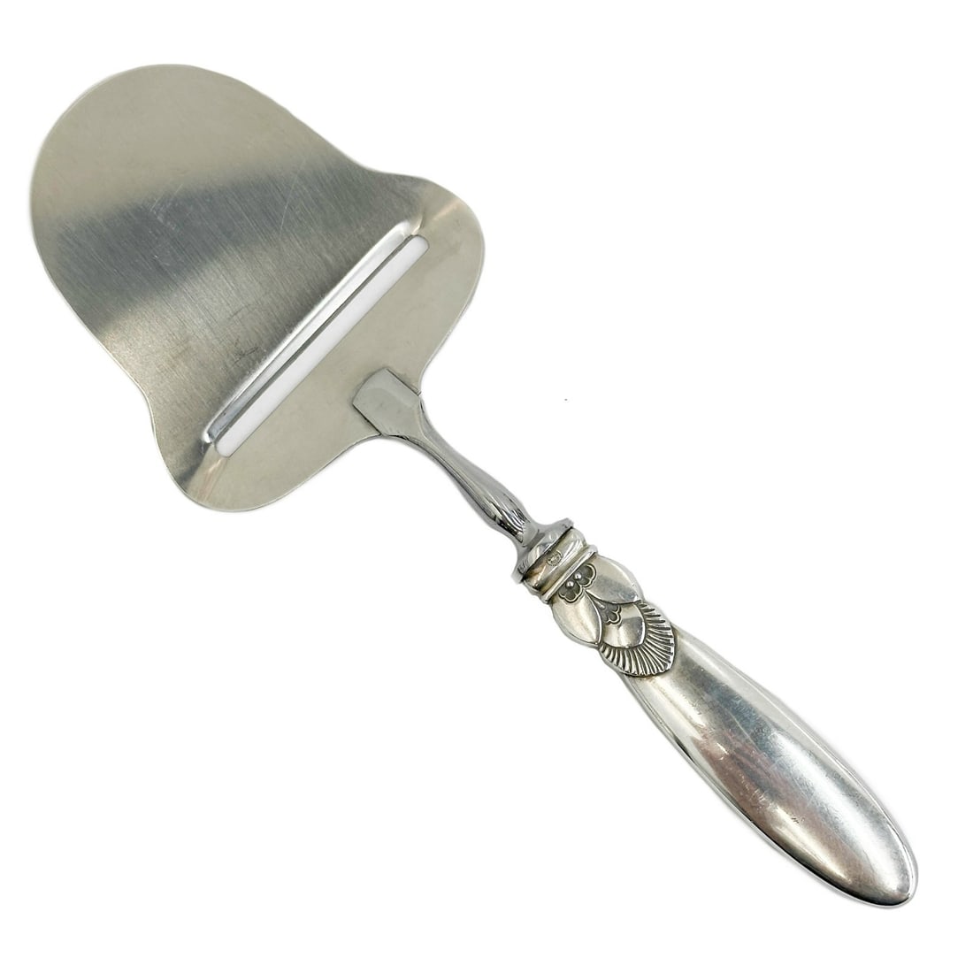 Georg Jensen Denmark Sterling Silver Stainless Steel Cheese Plane Server Cactus: Georg Jensen Denmark Sterling Silver and Stainless Steel Cheese Plane Server Cactus Weight: Approx. 2.9 gross ozt Measurements: Approx. 8.375 inches length Condition: Very good condition, scratches an