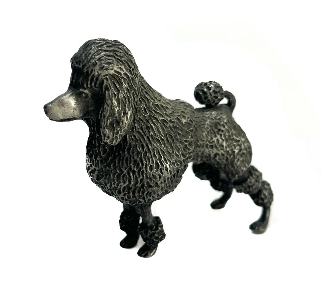 Reed & Barton Silverplate Miniature Poodle Figurine, Signed.: Reed & Barton silverplate miniature poodle figurine. Signed "Reed & Barton" to the interior of the stomach. Weight: Approx. 0.5 lbs Measurements: Approx. 3,25 inches x 1.5 inches x 3 inches tall Condi