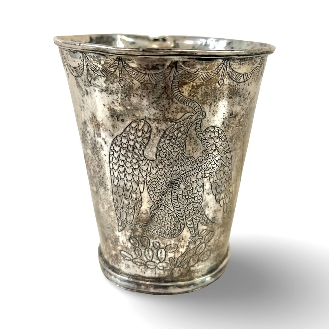 Spanish Colonial Mexican Silver Tankard eagle on a cactus eating a snake: Likely Spanish Colonial Mexican Silver Tankard, with engraved image an eagle on a cactus eating a snake - likely representing the Mexican Coat of Arms. Also, marked flanking the engraving, "Mo" and "S