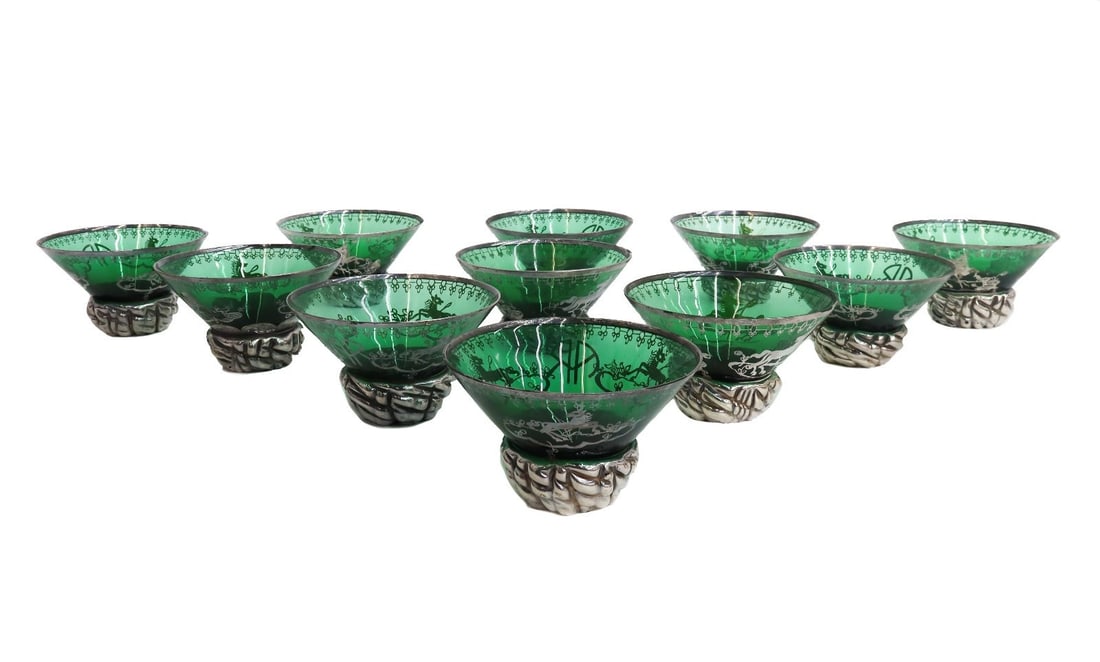 11 Murano Green Colored Glass and Silver Overlay Sherbet or Dessert Cups: 11 Murano green colored glass and silver overlay sherbet or dessert cups. Silver overlay horses to the center with a monogram "AR" Weight: Approx. 4 lb Measurements: Approx. 4.325 inches diameter x 2.