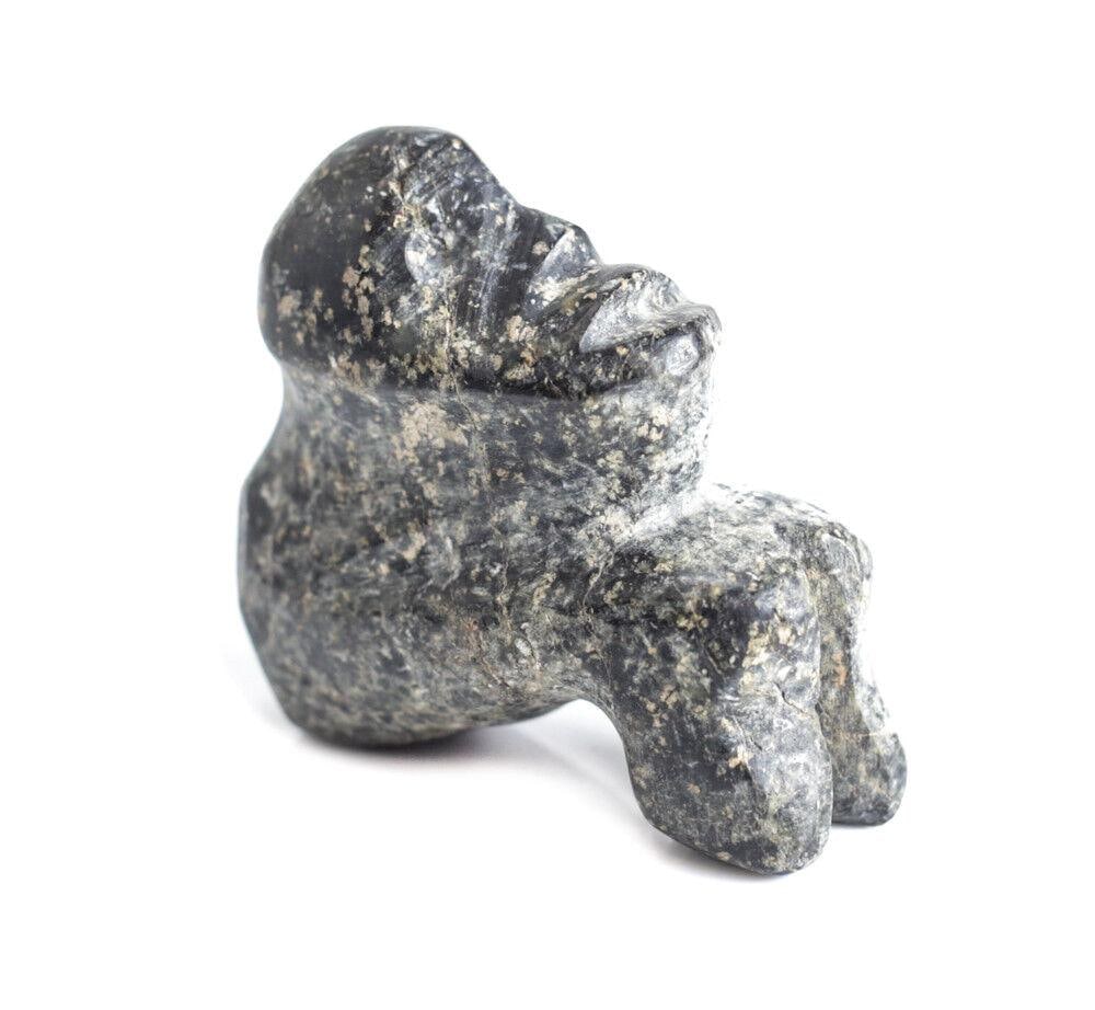 Pre Columbian Polished Black Stone Seated Figure Possibly Mezcala: Pre Columbian Polished Black Stone Seated Figure, Possibly Mezcala 131.1grams Measurements: Approx. 2.5" x 2.25" x 1". Condition: Condition commensurate with age, scattered flakes. No restorations not