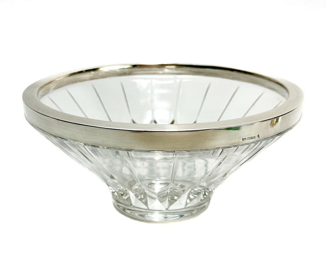 Gebruder German Sterling Silver and Cut Glass Bowl: Gebruder German sterling silver and cut glass bowl. Cut glass rays to the exterior. Marked Gebruder German sterling silver marks to the edge. Polished pontil to the underside. Weight: Approx. 1 lb Mea