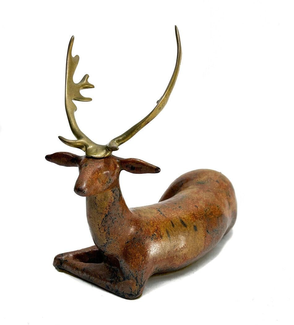 Loet Vanderveen (Dutch, 1921-2015) Ceramic Pottery Deer Sculpture: Loet Vanderveen (Dutch, 1921-2015) ceramic deer sculpture. The sculpture depicts a deer in a relaxed seated position. Marked Loet to the underside base. Weight: Approx. 2 lbs Measurements: Approx. 9.5