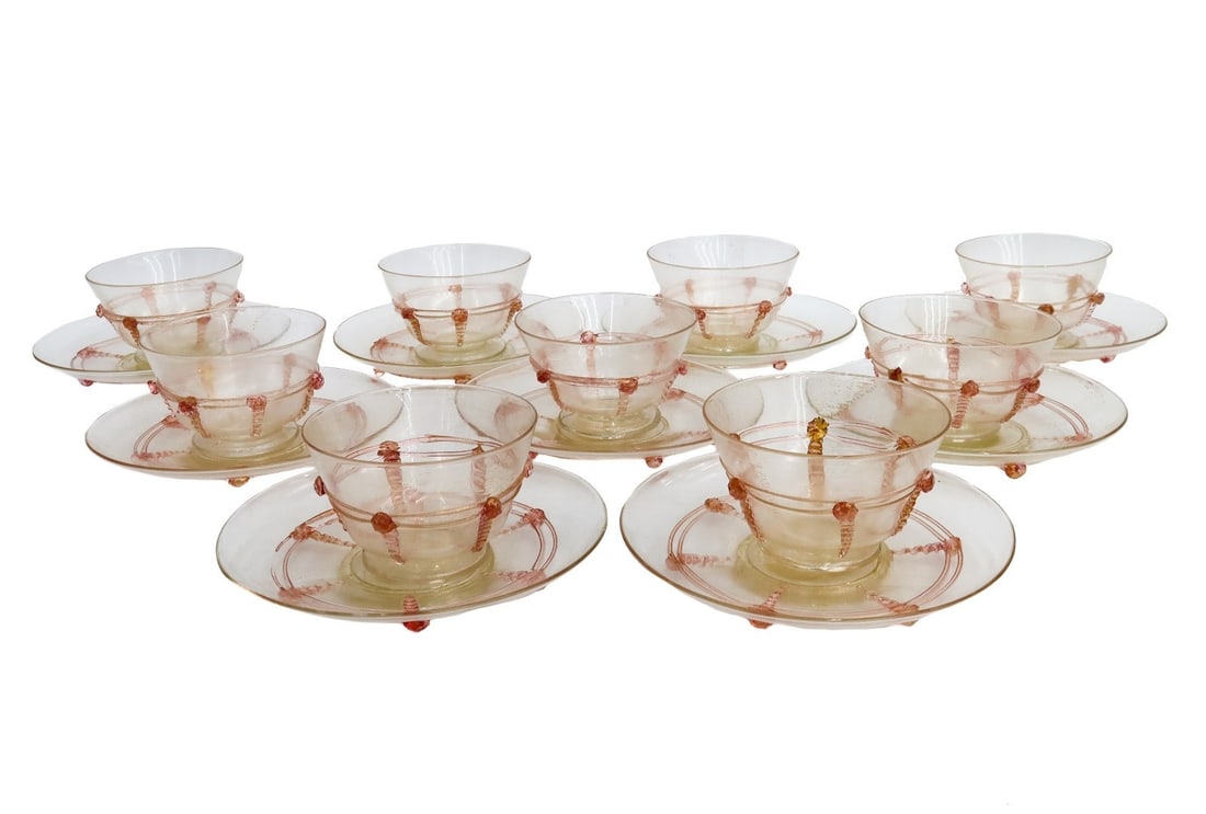 9 Salviati Cranberry Pink and Gold Fleck Bowls and Underplates Goblets: 9 Savliati cranberry pink and gold fleck glass bowl and underplates. Knotted design to lower half of bowl. Pontil underside. Weight: Approx. 3 lbs Measurements: Approx. Bowl: 4.25 inches diameter x 2.