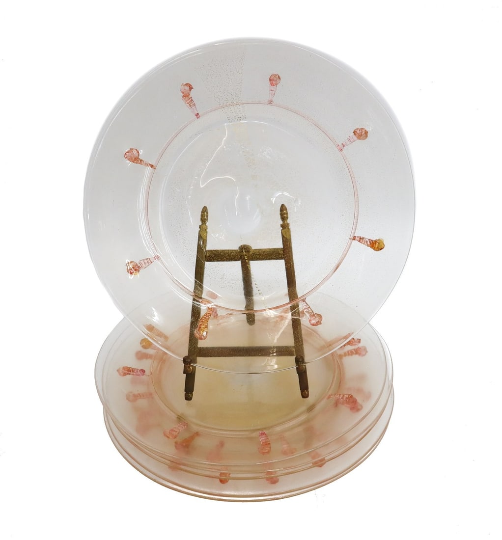 6 Salviati Cranberry Pink and Gold Fleck Glass Dessert Plates: 9 Savliati cranberry pink and gold fleck glass dessert plates. Knotted design to lower half of bowl. Pontil underside. Weight: Approx. 3 lbs Measurements: Approx. 9 inches diameter Condition: Great co