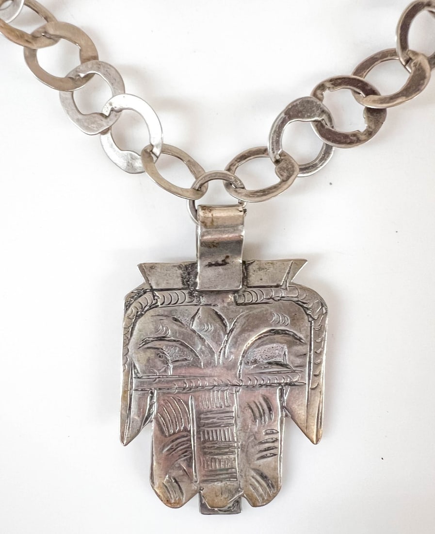 Silver Tunisian HAMSA Amulet Necklace rihan chain: Silver Tunisian HAMSA Amulet Necklace, rihan chain with engraved/stamped hamsa pendant. Two spring ring closures allows wearer to adjust the length of the chain. Unmarked, tested silver, likely 800 si