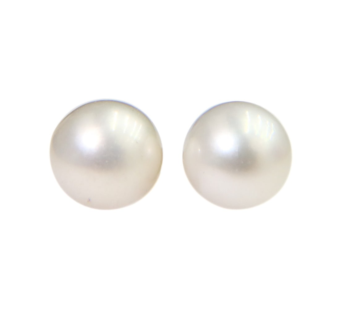 14k Yellow Gold and Cultured Pearl Stud Earrings: 14k yellow gold and black cultured pearl stud earrings. The pearls measuring 9.6mm.. Marked 14k to gold with maker mark "CP" Weight: Approx. 3 grams Measurements: Approx. 0.75 inches length Condition: