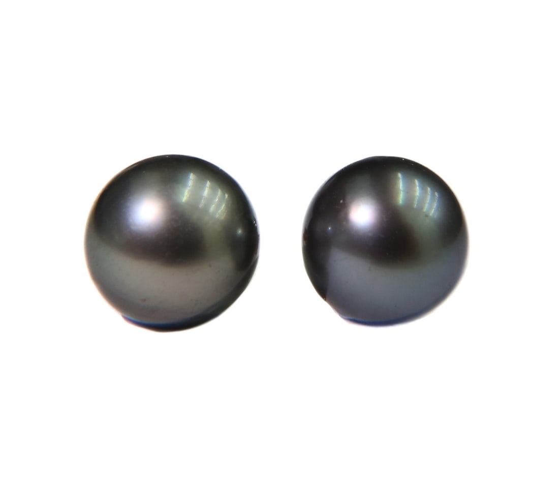 14k Yellow Gold and Black Cultured Pearl Stud Earrings: 14k yellow gold and black cultured pearl stud earrings. The pearls measuring 11.3mm.. Marked 14k to gold with maker mark "IPS" Weight: Approx. 4.40 grams Measurements: Approx. 0.82 inches length Condi