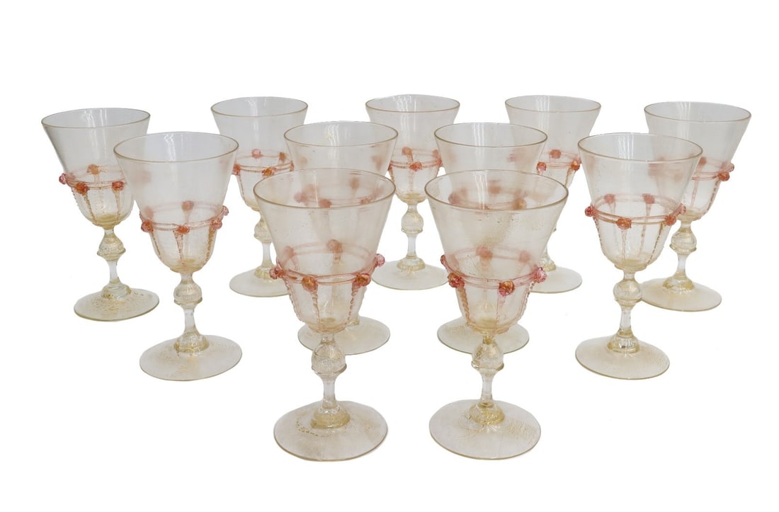 11 Salviati Cranberry Pink and Gold Fleck Wine Glass Goblets: 11 Salviati cranberry pink and gold fleck wine glass goblets. Knotted design to lower half of bowl. Pontil underside. Weight: Approx. 3 lbs Measurements: Approx. 3.5 inches tall x 6.75 inches tall Con