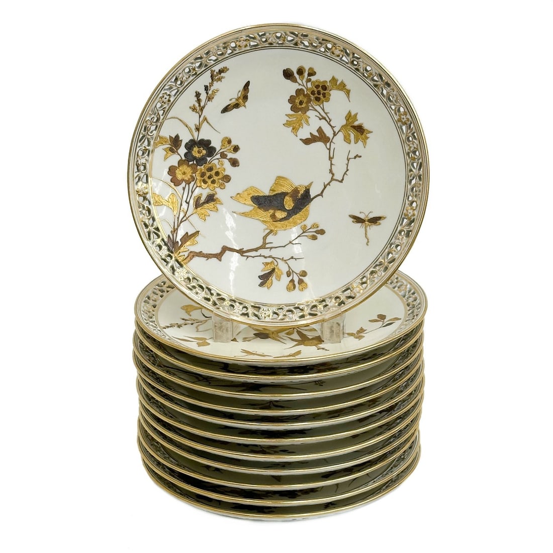 12 Pirkenhammer Czech Gilt Reticulated Porcelain 9 inch Plates c 1890: 12 Pirkenhammer Czechoslovakia Gilt Reticulated Porcelain Plates, circa 1890. 3 color raised gilt decoration to center of birds and florals. Underside marked for Pirkenhammer 2602. Weight: Approx. 12 