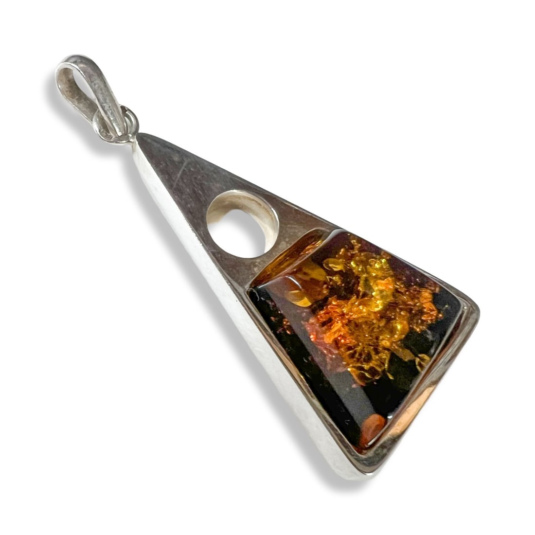 Vintage Russian 875 silver and Baltic Amber Modernist Pendant: Vintage Russian 875 silver and Baltic Amber Pendant, modernist form. Hallmarks on the bale. c1970-80. Measurements: Approx. 19.91grams. pendant 2 x 1.125 x 0.5 inches; with bale 2.625 inches length Co