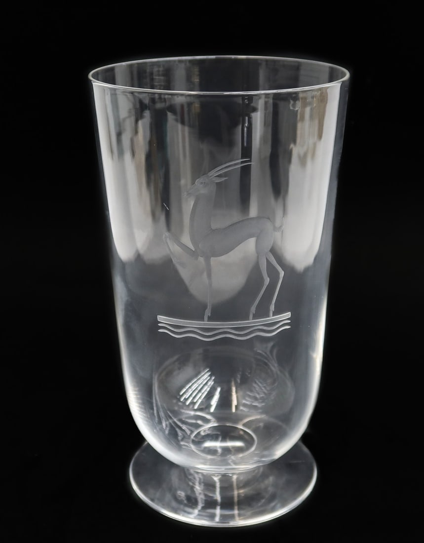 Steuben Crystal Art Glass Gazelle Footed Vase by Sidney Waugh #8208: Steuben Crystal Art Glass Gazelle Footed Vase by Sidney Waugh #8208. Designed by Sidney Waugh and depicts an engraved Gazelle standing next to a body of water. Marked Steuben to underside. Weight: App