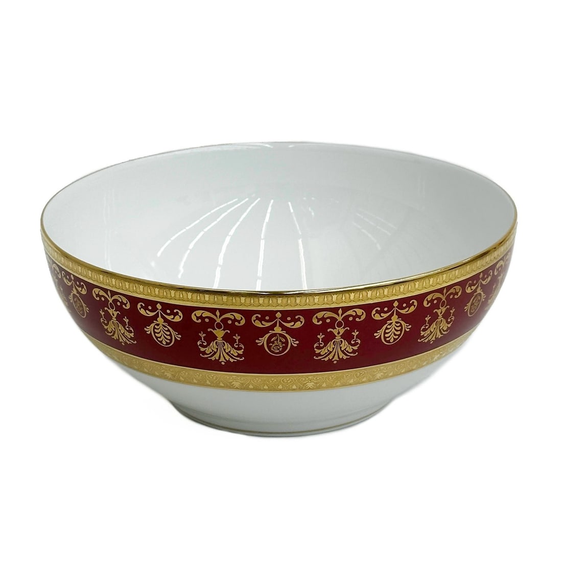 Raynaud Limoges France Gilt Porcelain Salad Bowl in Eugenie Rouge: Raynaud Limoges France Gilt Porcelain Salad Bowl in Eugenie Rouge. A burgundy red ground to the edge with ornate gilt decoration, raised accents. Underside marked Raynaud Limoges "Eugenie"From the Pre
