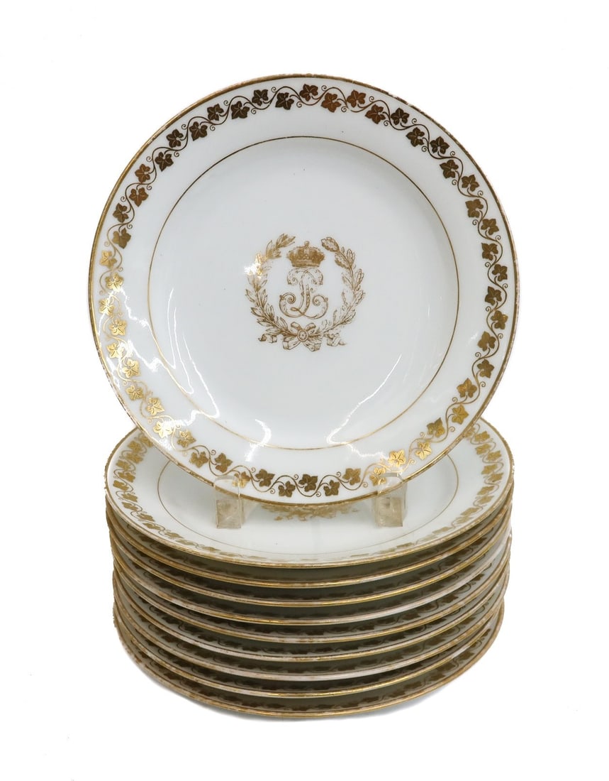 10 Sevres Style Porcelain Dessert Plates in Louis Philippe Early 20th Century: 10 Sevres style porcelain dessert plates in Louis Philippe Early 20th Century. Gold ivy leaf vines to rim with Louis Phillipe "L" emblem to center. Weight: Approx. 10 lbs Measurements: Approx. 8.6 inc