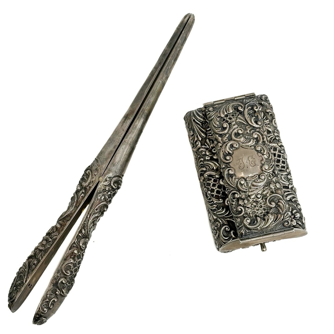 Charles Henry Dumenil English Sterling Silver Curling Iron & Heater 1897: Charles Henry Dumeil English Sterling Silver Curling Iron and Traveling Curling Iron Heater. Ornate repousse silver decoration, monogrammed "J.G." With London sterling silver hallmarks, date code for 