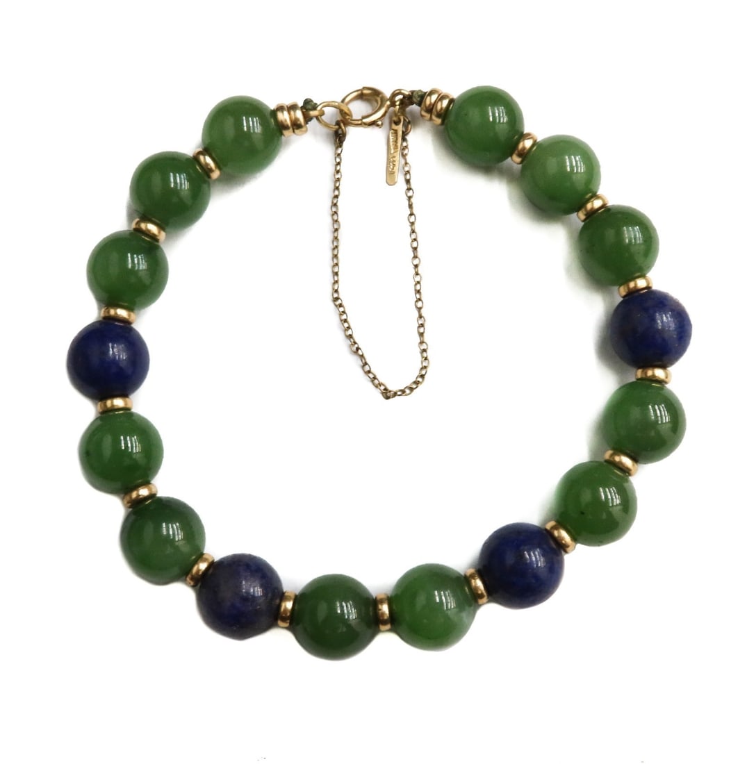 Tiffany & Co 14k Yellow Gold Nephrite Jade and Lapis Lazuli Beaded Bracelet: Tiffany & Co 14k yellow gold Nephrite Jade and Lapis Lazuli beaded bracelet. The jade and lapis measure approximately 10.16mm. Marked Tiffany & Co. 14k to clasp. With Tiffany & Co. dust bag and box. W