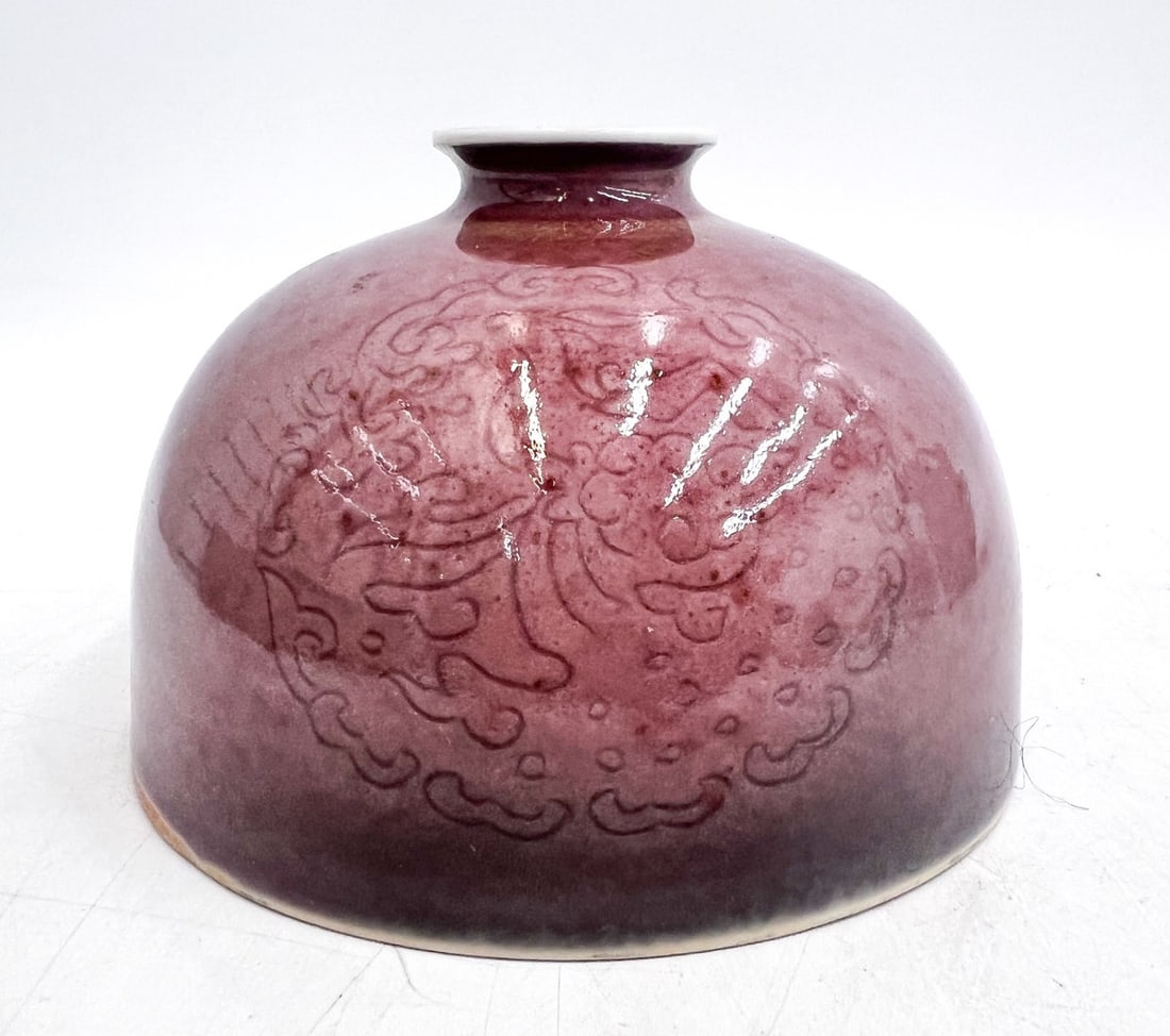 Chinese Peach Bloom glazed Water Pot Taibai Zun: Chinese Peach Bloom glazed Water Pot Taibai Zun. Small flared mouth, impressed design on the sides, mottled colors from plum to pink to touches of light green. Underglaze dynastic style marks on foot.