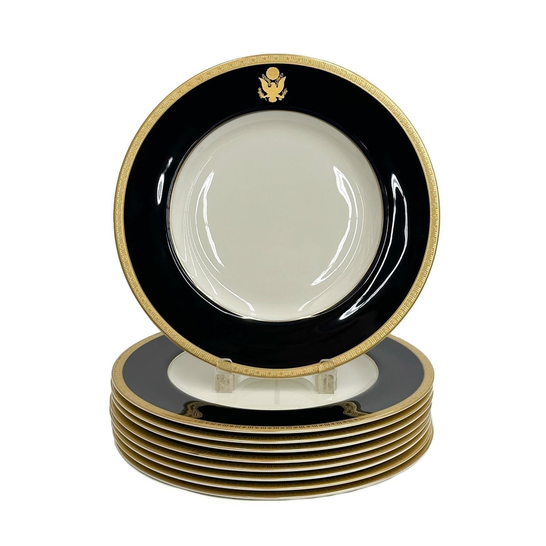 9 Pickard American Dinner Plates Cobalt Blue US Embassy Seal Stars & Stripes: 9 Pickard American Porcelain Dinner Plates. A cobalt blue ground with a gilt US Embassy seal to the edge, stars and stripes decoration to the rim. Underside marked Pickard Made in USA Weight: Approx. 
