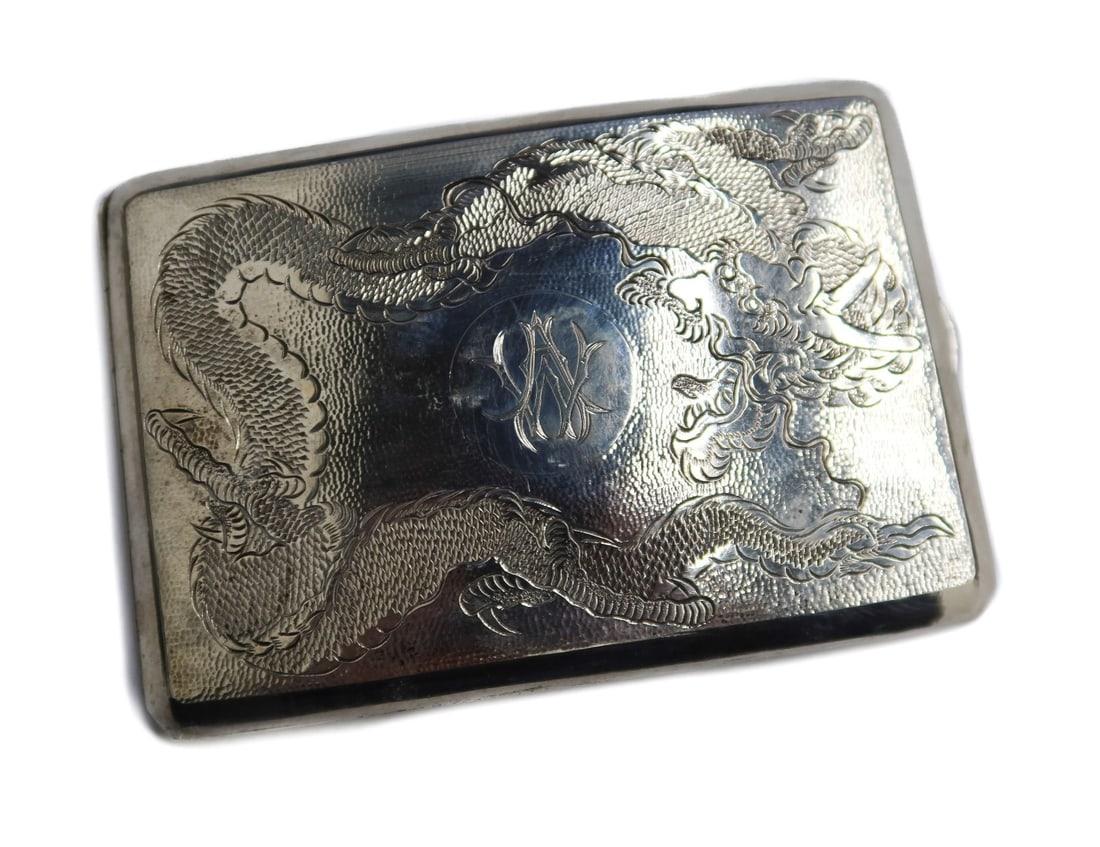Chinese Wingchong 900 Silver Cigarette Case Etched Dragon circa 1920 Gold Wash: Chinese Wingchong 900 Silver Cigarette Case, circa 1920. Hand hammered texture with an etched dragon to center and monogrammed "W" to center. Gold wash interior with an inscription from Christmas 1945