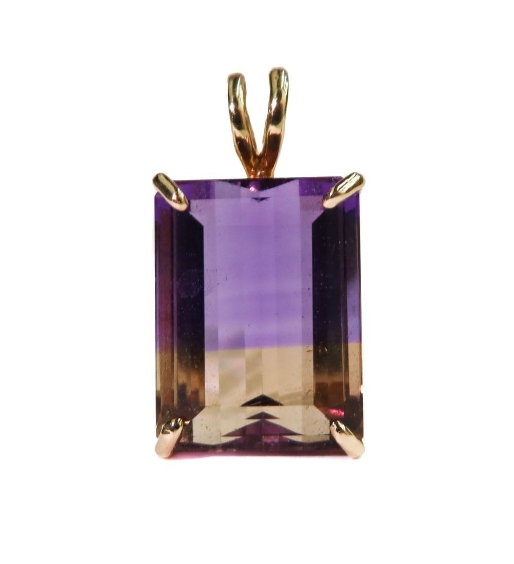 14k Yellow Gold Ametrine Necklace Pendant: 14k Yellow Gold Ametrine Necklace Pendant. Rectangular cut Ametrine measuring approximately 15.9mm x 12mm x 8.2mm and weighing around 10.37 carats. Marked 14k to hook. Weight: Approx. 4.17 grams Measu