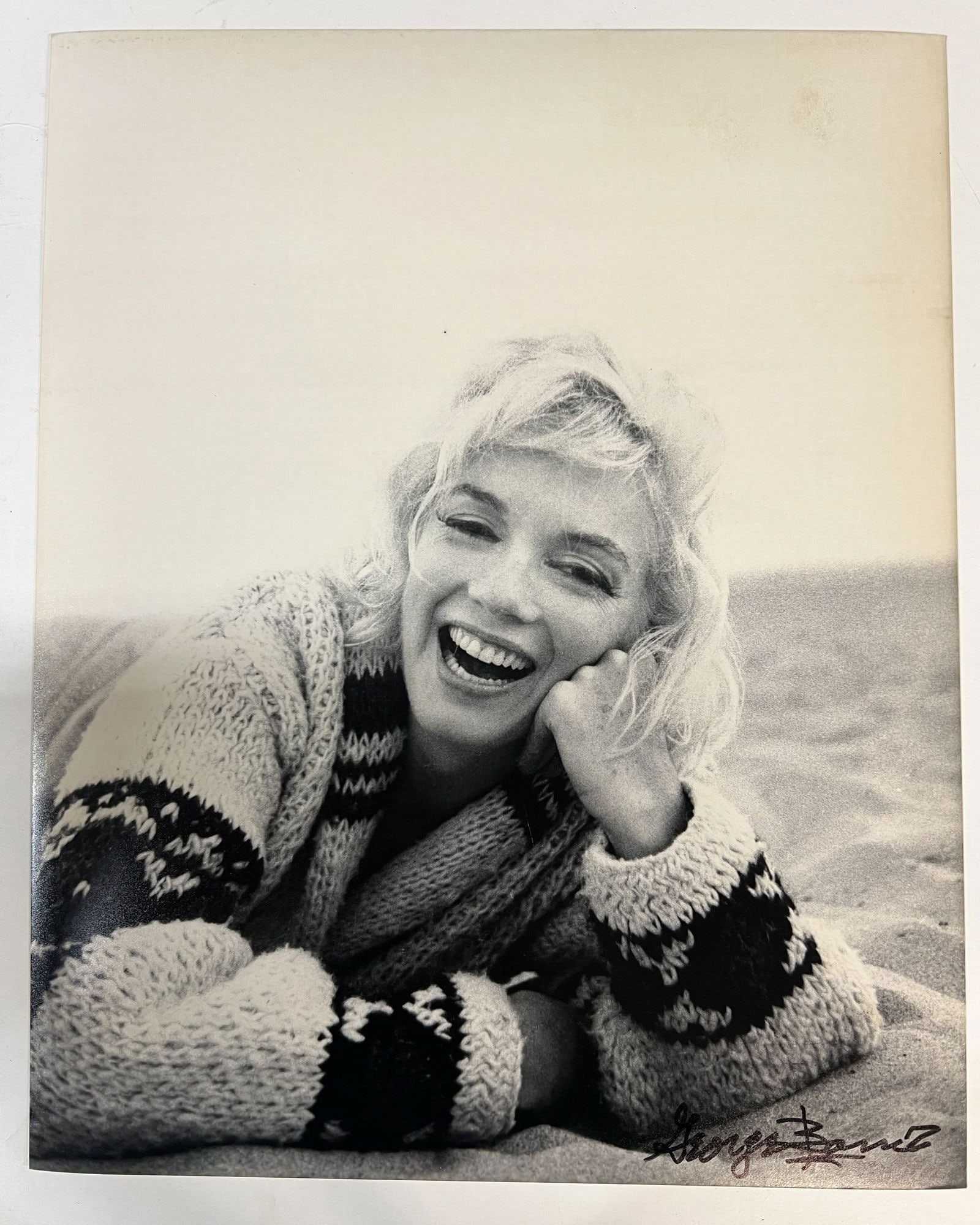 Black and White Photograph Marilyn Monroe: A limited edition George Barris black and white photograph of Marilyn Monroe. Signed by George Barris in marker (lower right). Stamped and numbered on reverse. Marilyn Monroe at Santa Monica Beach in 