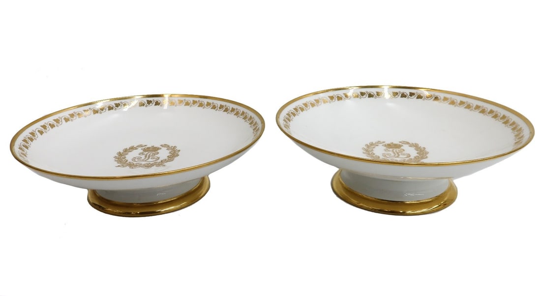 Pair Manufacture de Sevres Porcelain Compotes Chateau Fontainebleau 1834 / 1841: Pair Manufacture de Sevres Gilt Porcelain Compotes. Gilt stylized monogram to the center beneath a crown, ivy leaves to the edge. Underside marked for Chateau Fontainebleau to one, Sevres date marks f